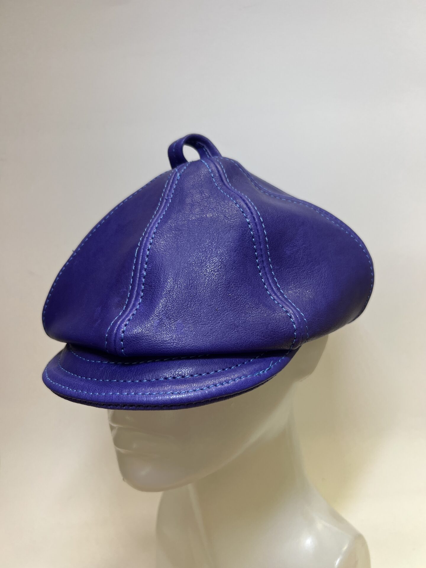 Pointed purple 8 piece cap 57 cm